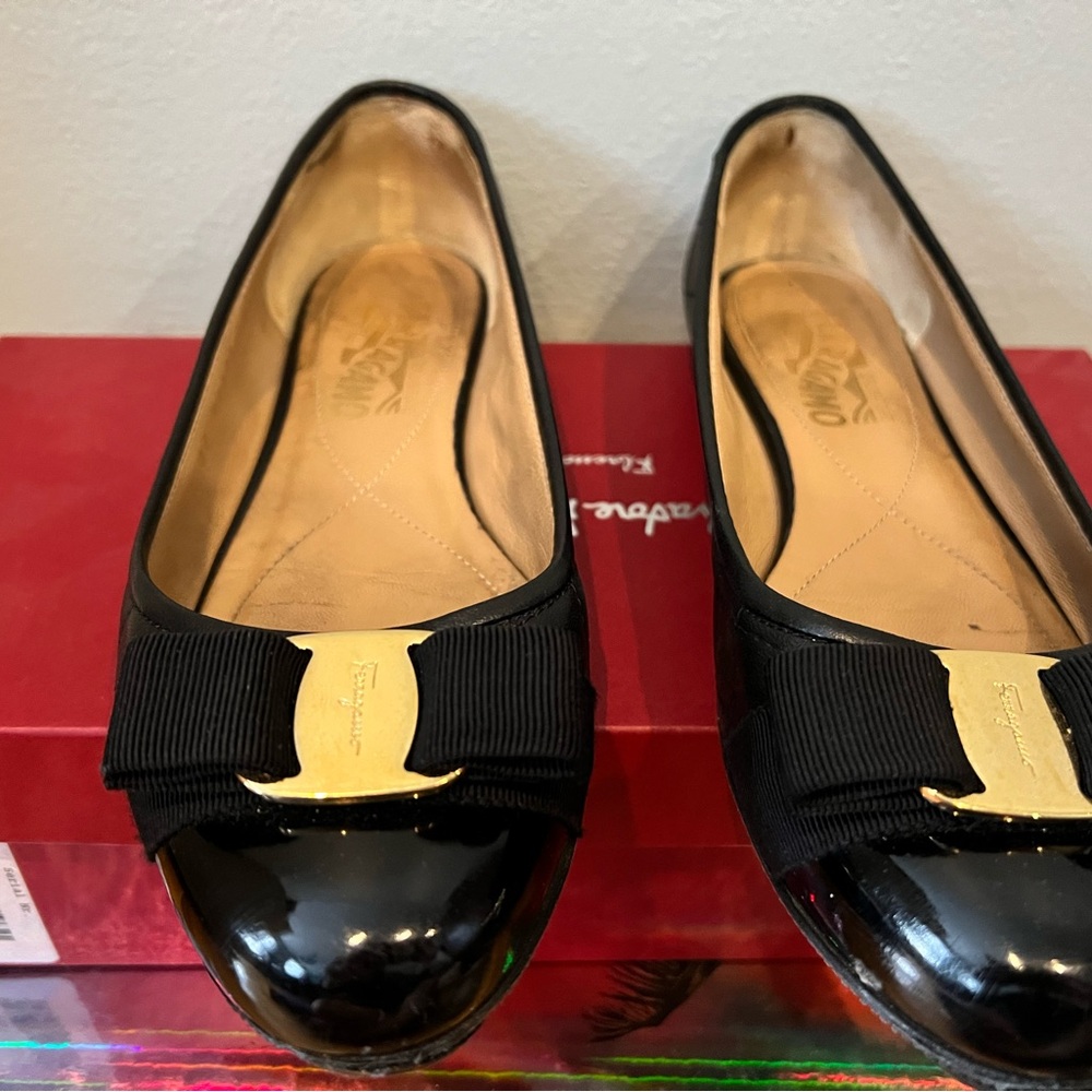 Salvatore Ferragamo Black Flats with Gold Vara Bow